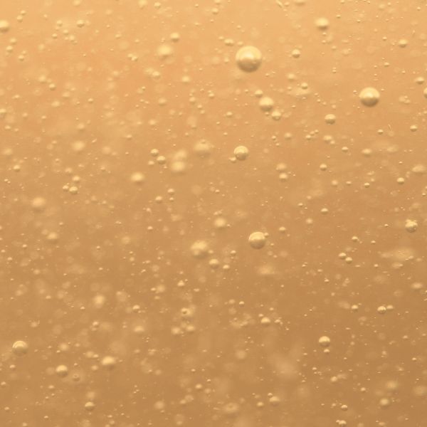 Closeup image of olive oil, used in Simple Alchemy Co's sustainable home and body products