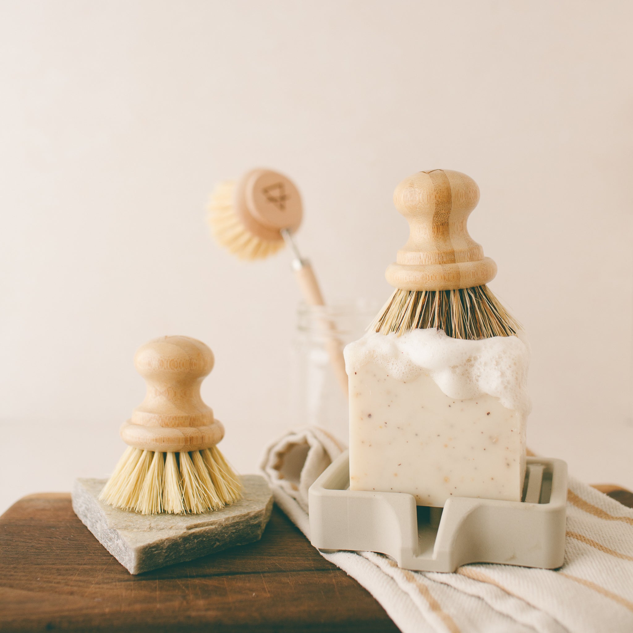 Solid Dish Soap and compostable bamboo dish brushes, perfect for the eco friendly kitchen.