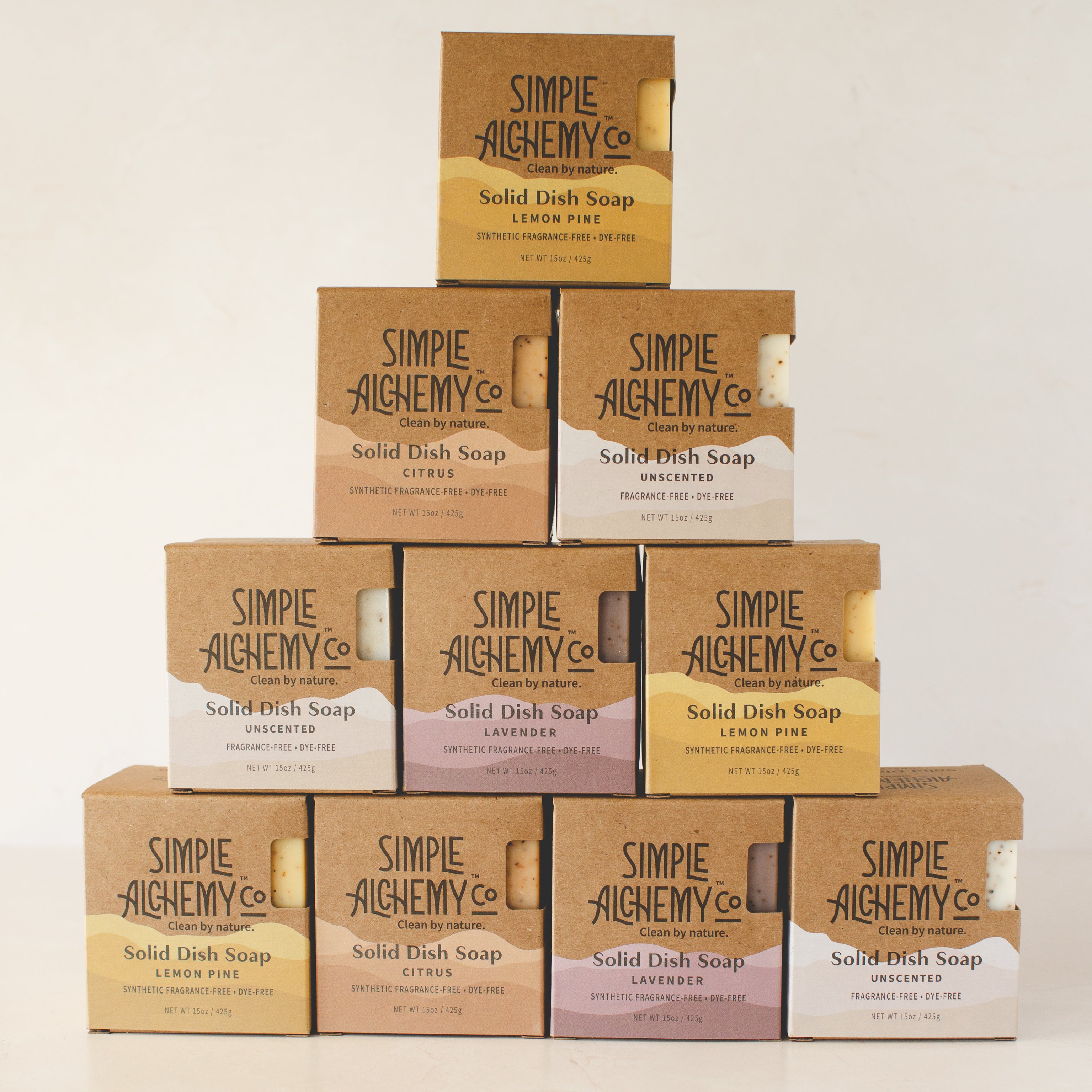 A stacked collection of Solid Dish Soap from Simple Alchemy Co, featuring Citrus, Lavender, Unscented, and Lemon Pine