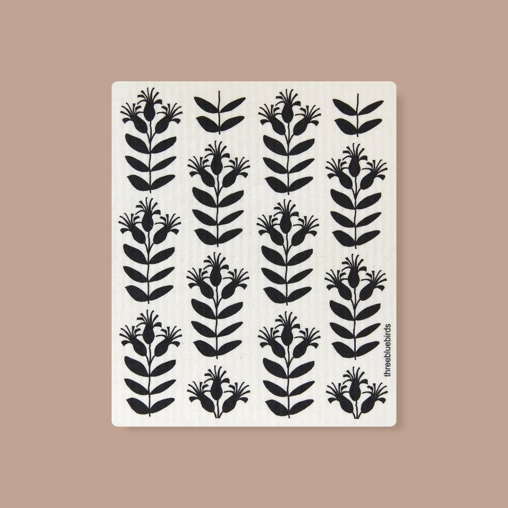 Biodegradable Swedish dishcloth with minimalist black buds theme, plastic-free cleaning essential.