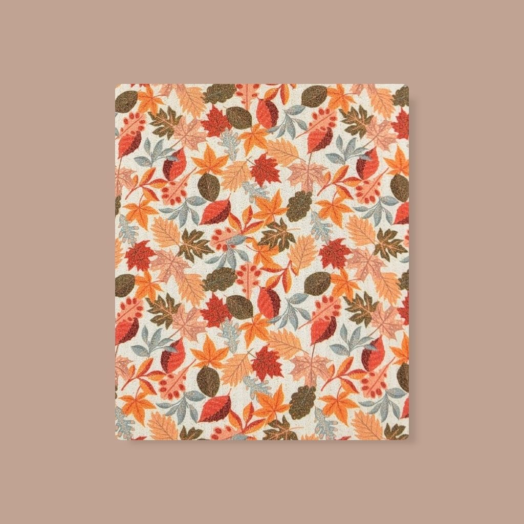 Reusable Swedish sponge cloth with vibrant fall leaf pattern, plastic-free cleaning solution.
