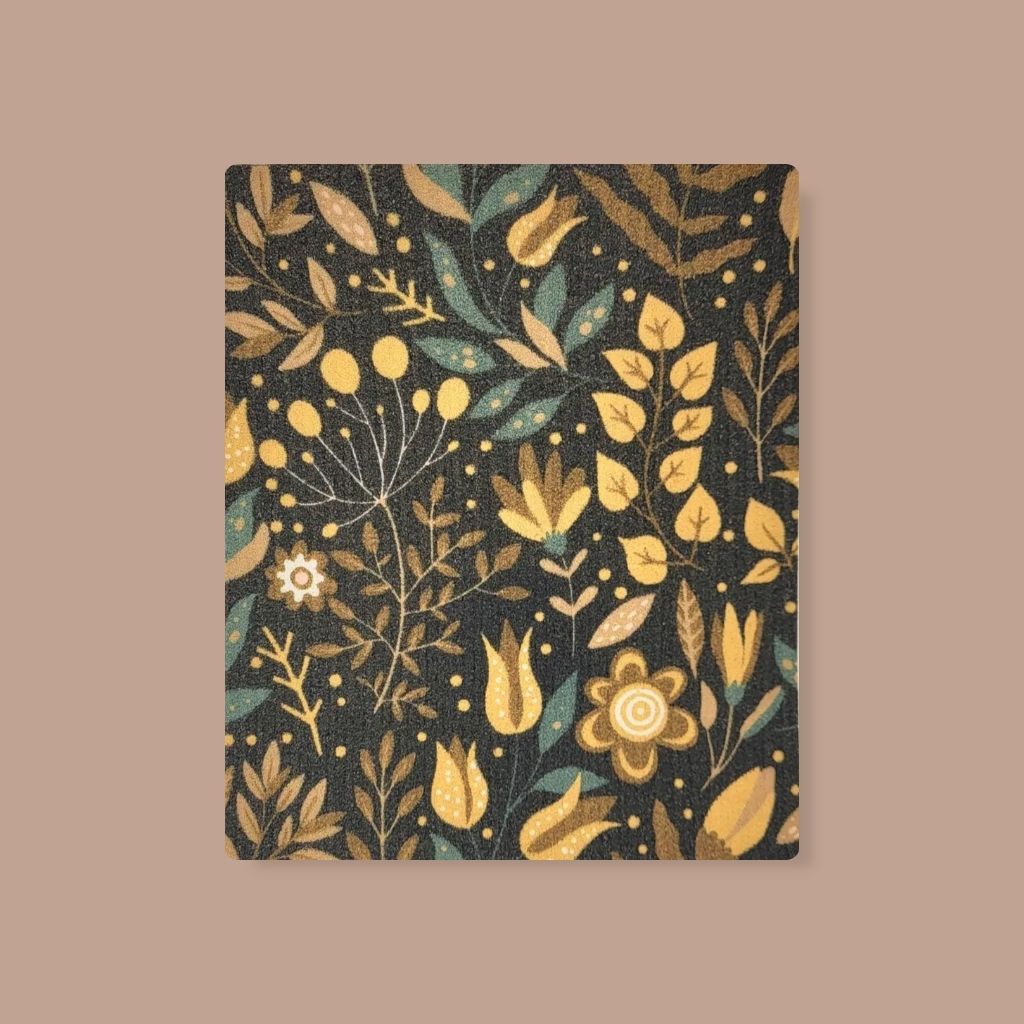 Sustainable Swedish dishcloth featuring golden spring flowers, biodegradable and compostable.