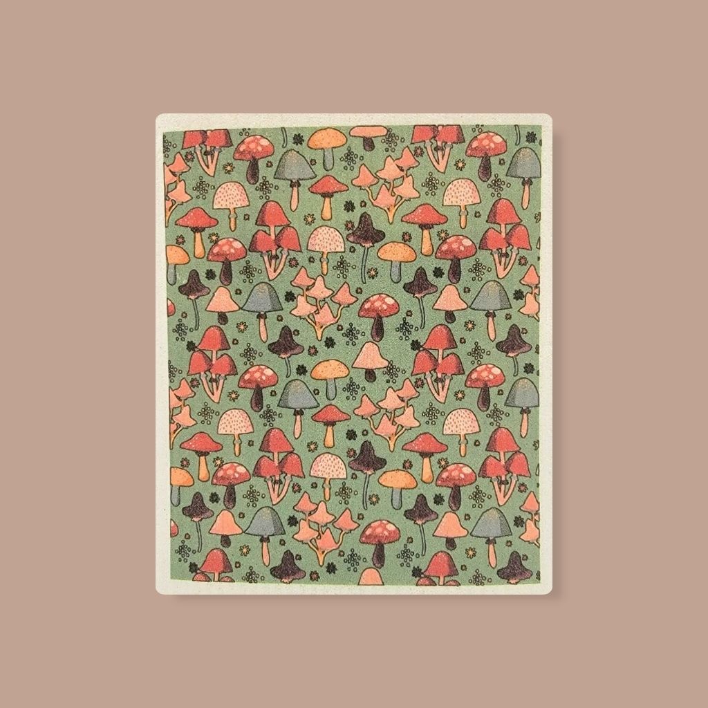Zero waste Swedish dishcloth with fall mushroom pattern, ideal paper towel alternative.