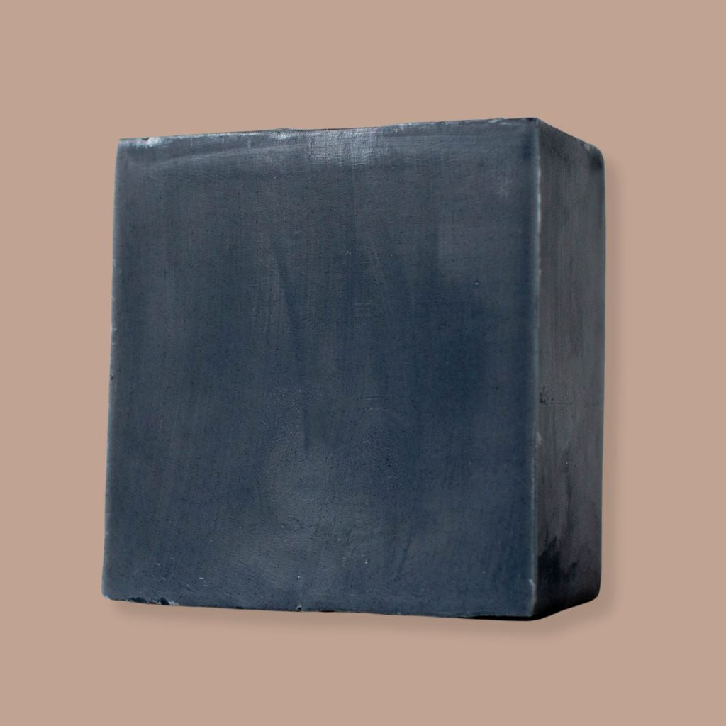 Unscented bar soap made with Activated Coconut Charcoal for body odor, and sensitive oily skin. Handmade by Simple Alchemy Co.