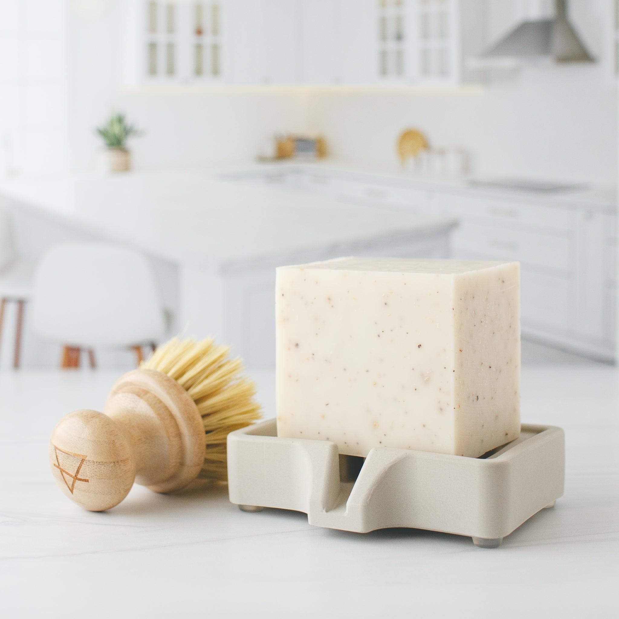 Natural bamboo dishwashing brush designed for effective cleaning.