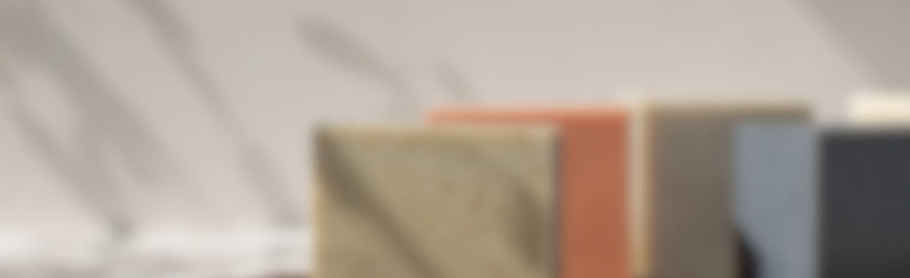 Blurred Simple Alchemy Co. products representing sustainable, low-waste living.