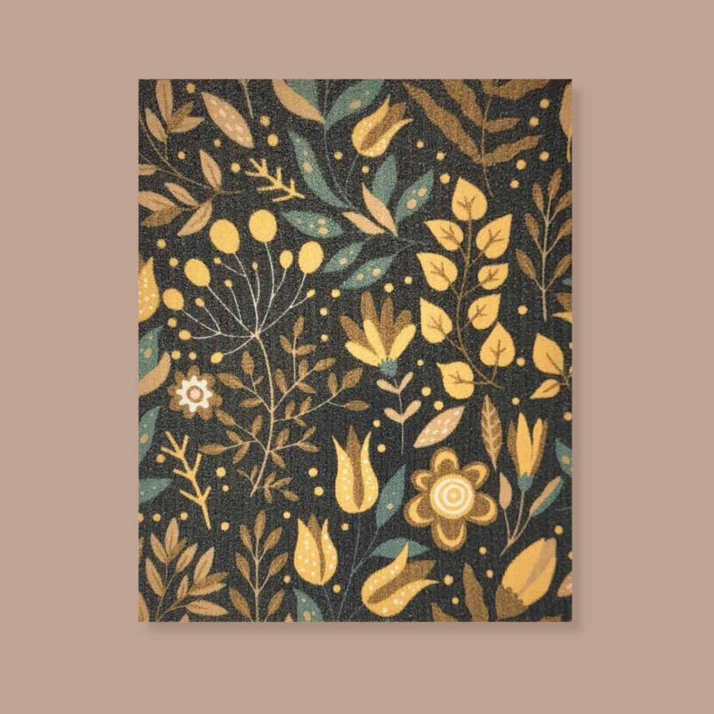 Sustainable Swedish dishcloth featuring golden spring flowers, biodegradable and compostable.