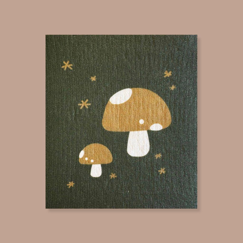 Charming Swedish dishcloth showcasing two golden mushrooms on green, great for daily dishwashing.