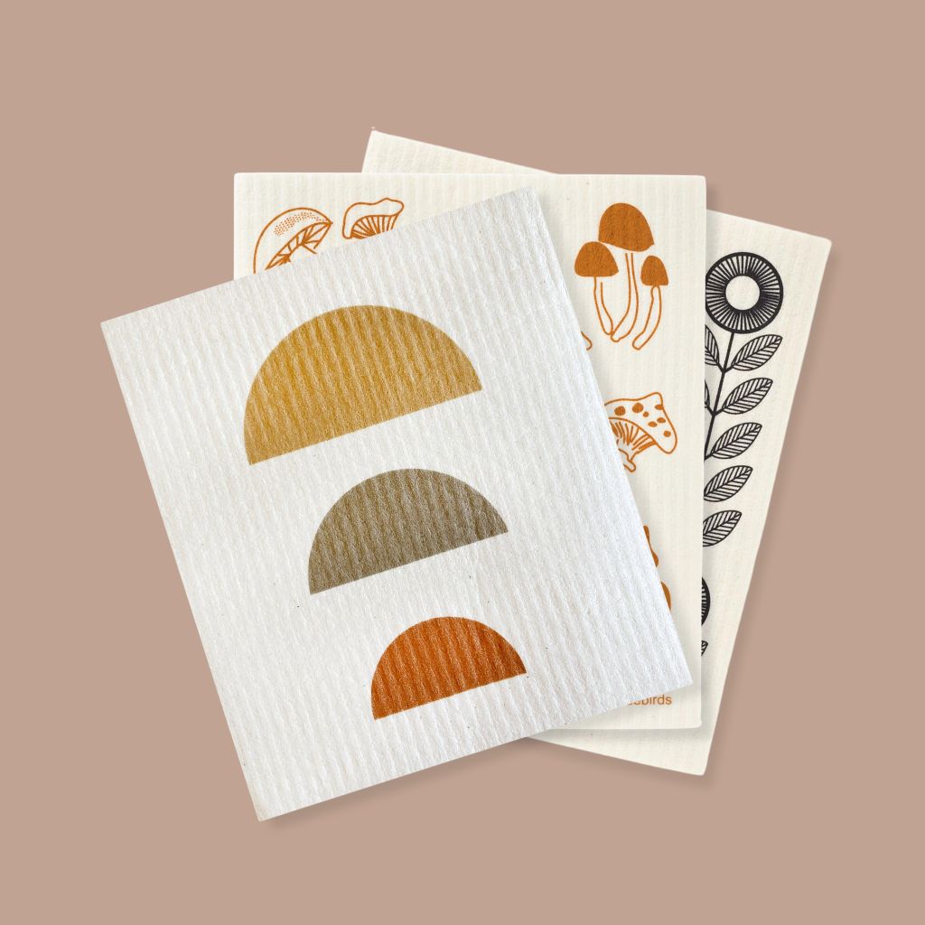 Trio of Swedish Dishcloths featuring Half Moons, Fungi on White, and Black Sunflowers. Compostable and absorbant.