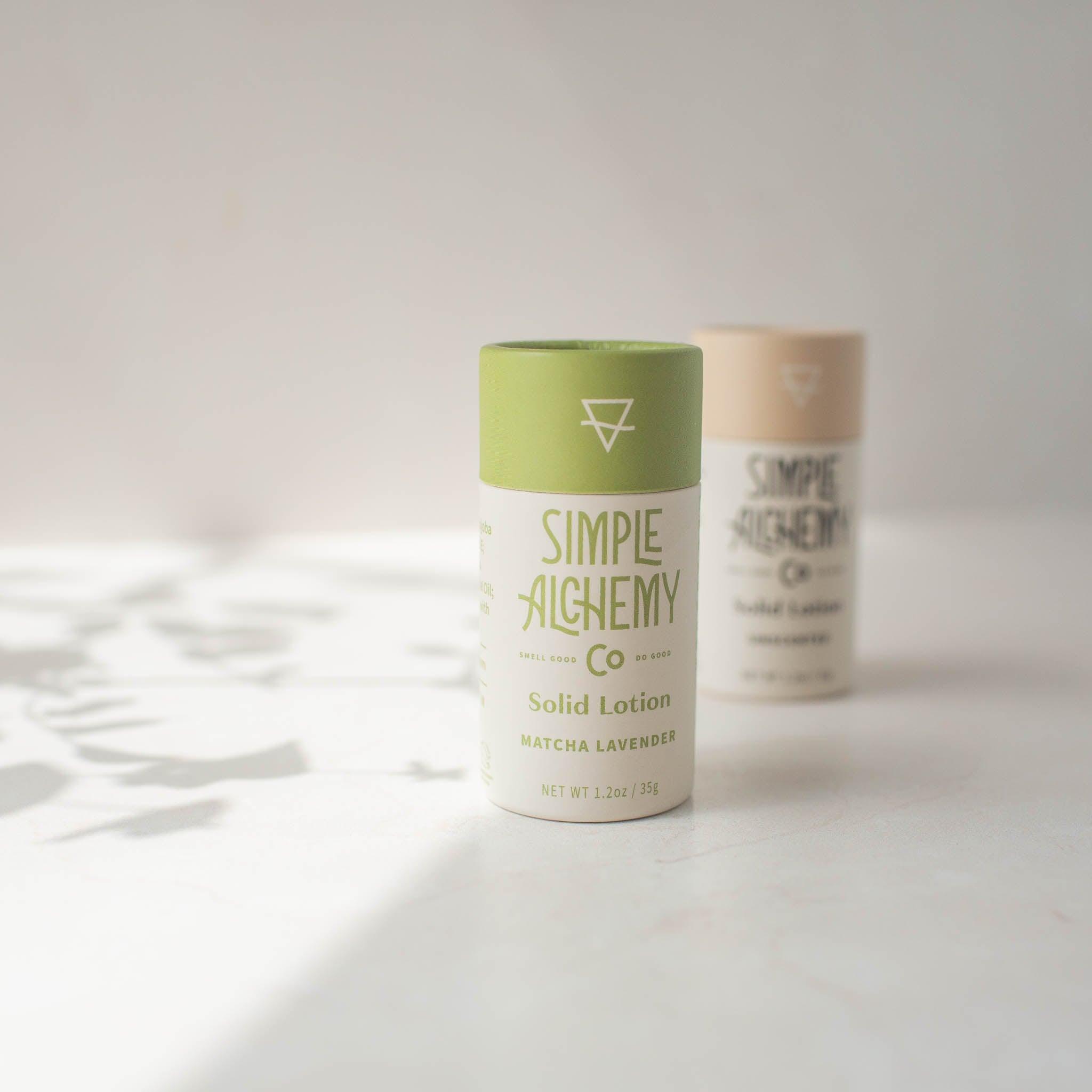 Green and cream compostable tube of Matcha Lavender Solid Lotion.