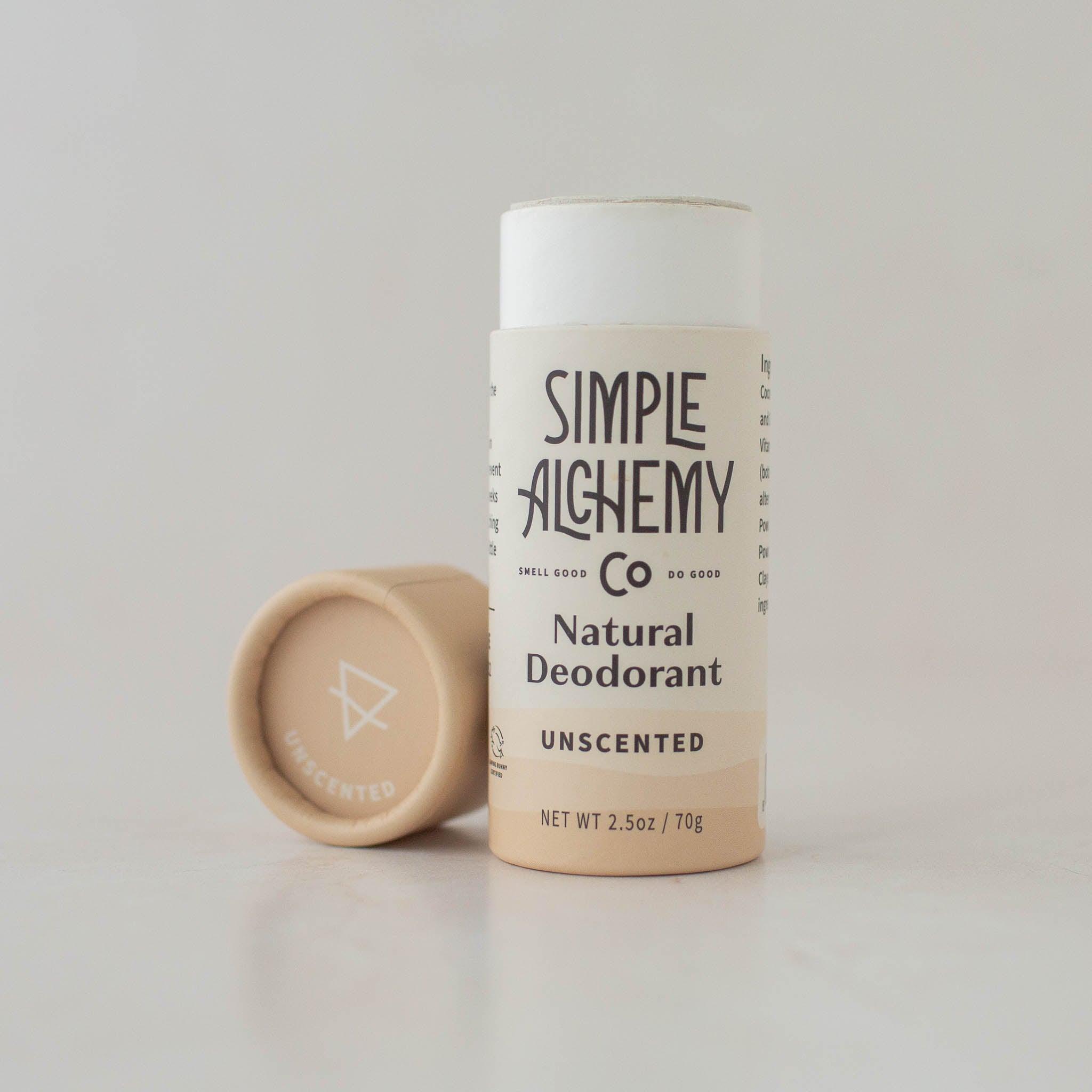 Cream colored compostable paper push-up tube of Unscented Natural Deodorant with cap off.